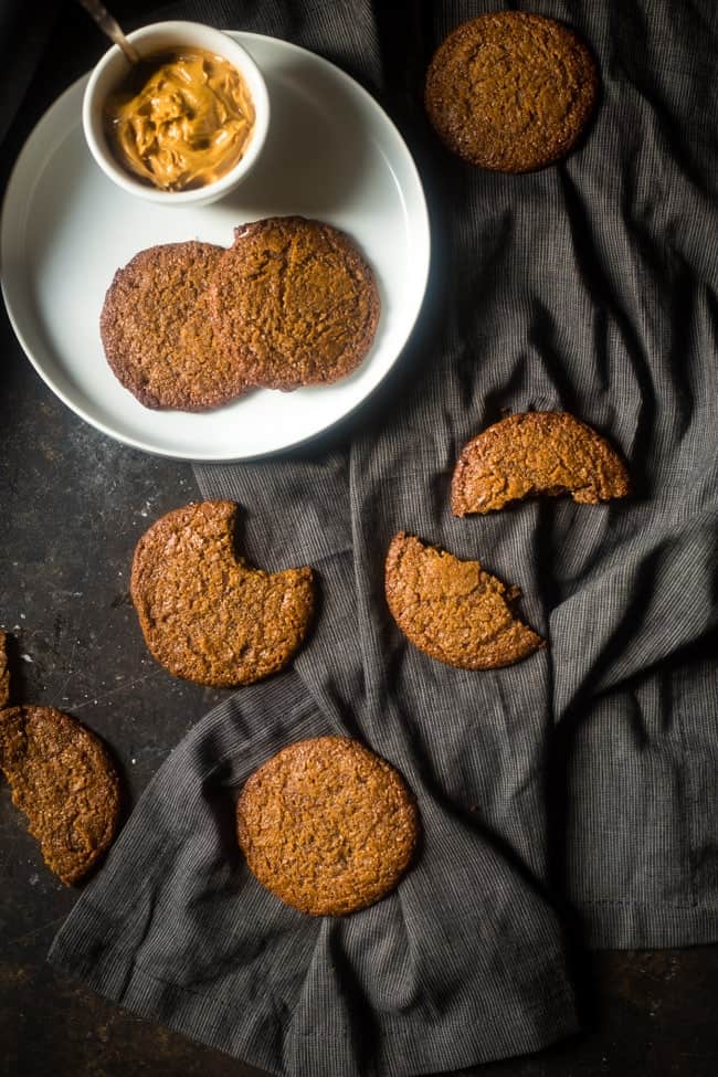 Vegan and Paleo Almond Butter Spice Cookies - You'll never know these spicy-sweet, crispy on the outside and chewy on the inside paleo cookies are secretly healthy and vegan friendly! Perfect for Christmas! | Foodfaithfitness.com | @FoodFaithFit