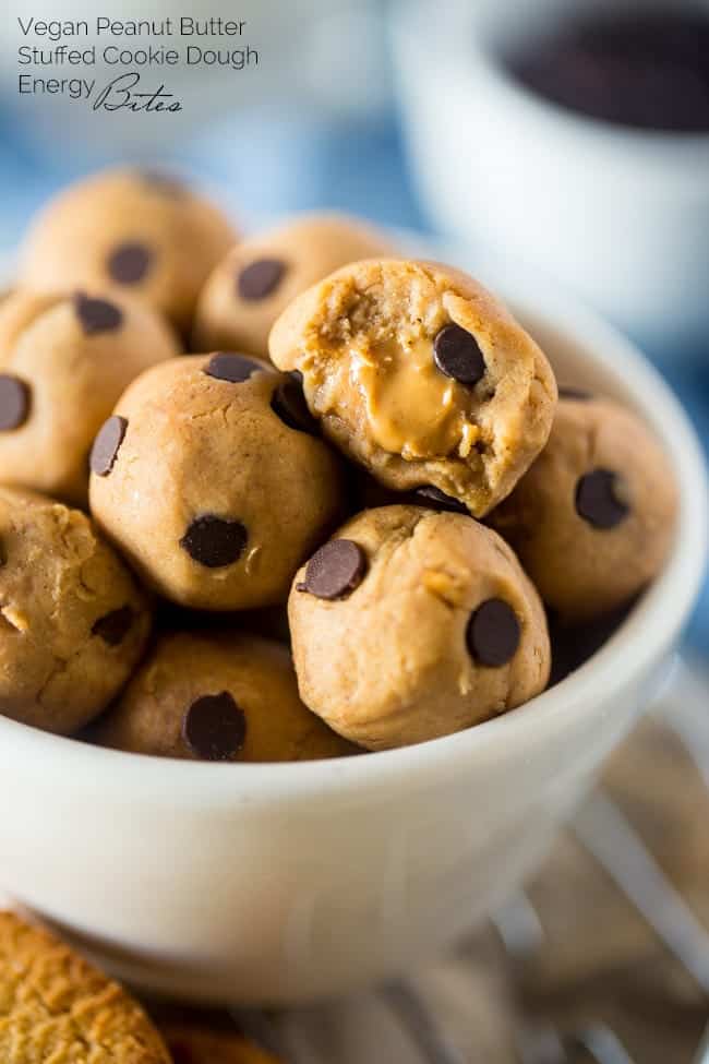 Peanut Butter Stuffed Vegan Cookie Dough Bites - SO easy to make and loaded with peanut butter and chocolate chips! You would never know they're secretly healthy, gluten free and only 65 calories! | Foodfaithfitness.com | @FoodFaithFit