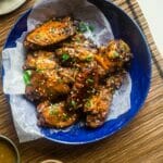 Whole30 Sticky Pineapple 5 Spice Slow Cooker Chicken Wings - Let the slow cooker do the work for you with these Asian-inspired chicken wings! You'll never know they're secretly whole30 and paleo compliant! Perfect for game day! | Foodfaithfitness.com | @FoodFaithFit