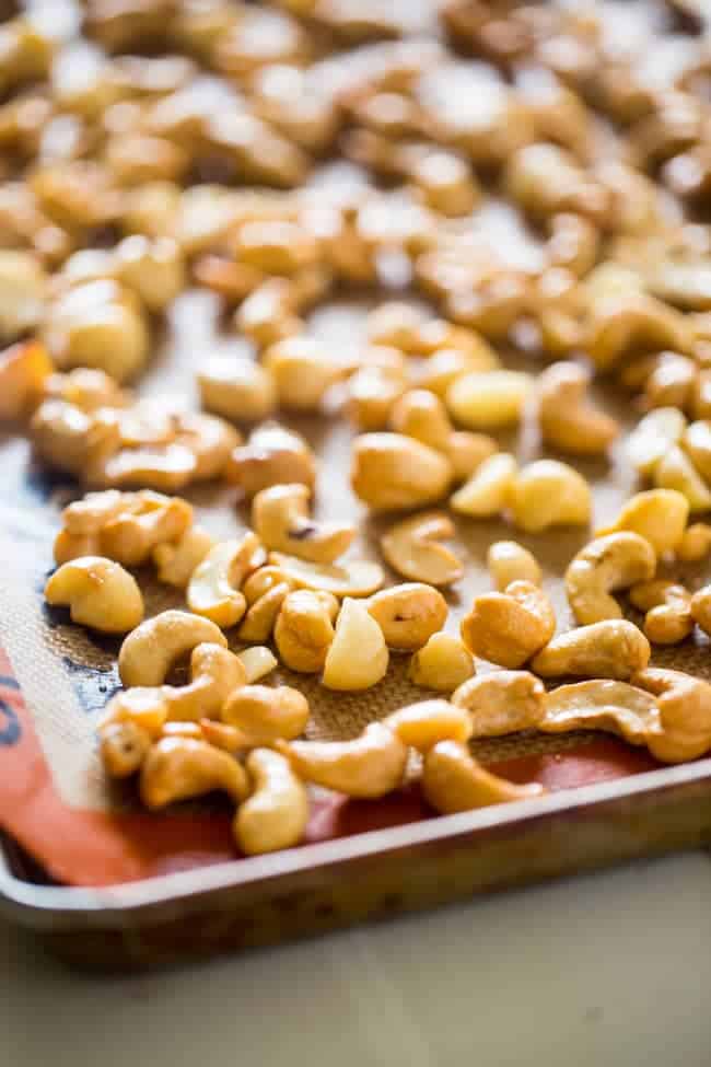 Vegan Cake Batter Macadamia Cashew Butter - This 6 ingredient vegan cake batter cashew butter is made extra delicious with macadamia nuts! It's an easy, healthy spread that tastes like funfetti cake! | Foodfaithfitness.com | @FoodFaithFit