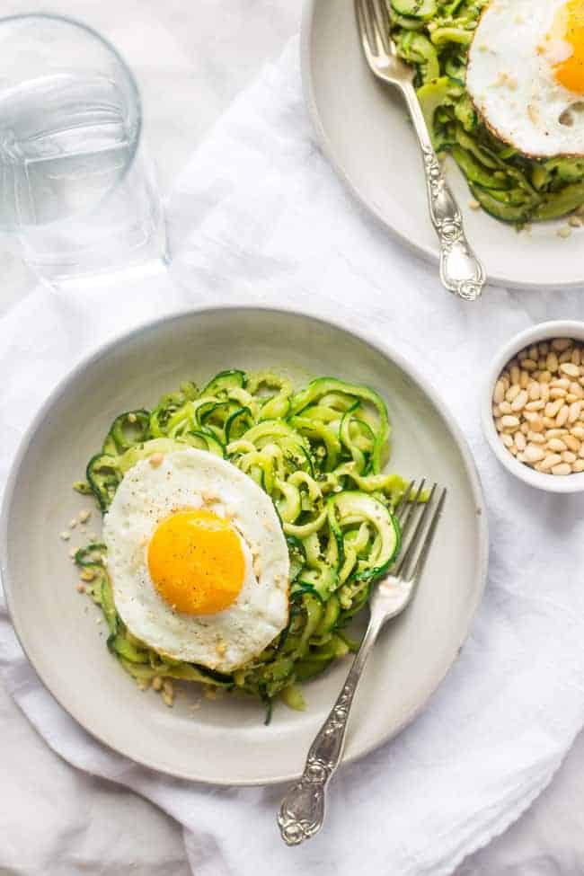 zucchini noodles with pesto on a plate
