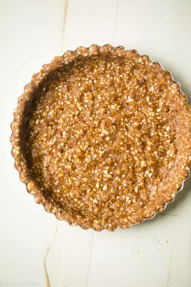 Gluten Free Orange Pie with Almond Crust - This easy, healthy orange pie uses a secret ingredient to make it PACKED with protein and low in calories! It's perfect for breakfast, snack or dessert! | Foodfaithfitness.com | @FoodFaithFit