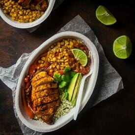 Paleo Chipotle Chicken Burrito Bowls - Make your own healthy, gluten free and paleo-friendly Chipotle Burrito Bowl at home with this quick and easy, 30 minute recipe! It's perfect for busy weeknights and under 450 calories! | Foodfaithfitness.com | @FoodFaithFit