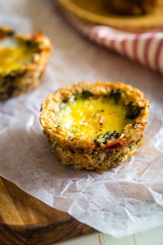 Egg Muffins with Savory Oatmeal Crust - These quick and easy egg muffins have a vegetable and savory oatmeal crust! They're a healthy and gluten free portable snack or breakfast for busy mornings, with only 80 calories and 2 SmartPoints! | Foodfaithfitness.com | @FoodFaithFit