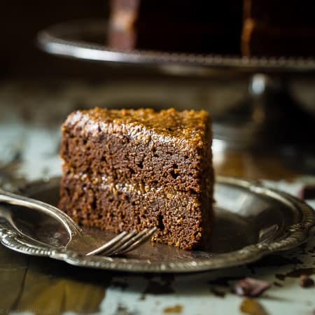 Paleo German Chocolate Cake - You'd never know this rich, moist German Chocolate Cake is a healthy remake that is paleo friendly and gluten, grain, oil, butter and refined sugar free! | Foodfaithfitness.com | @FoodFaithFit