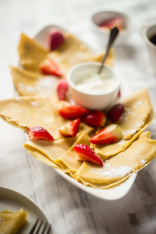 Paleo Crepes - These gluten free, paleo crepes are SO easy to make. Stuff them with your favorite fillings for a healthy breakfast or brunch that's only 75 calories and 3 SmartPoints! | Foodfaithfitness.com | @FoodFaithFit