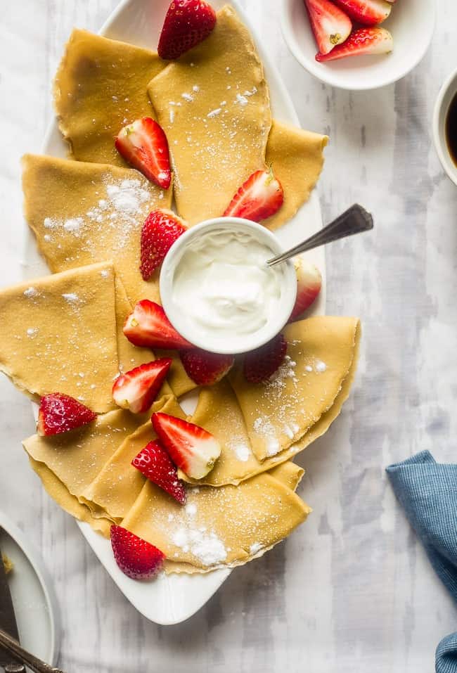 Paleo Crepes - These gluten free, paleo crepes are SO easy to make. Stuff them with your favorite fillings for a healthy breakfast or brunch that's only 75 calories and 3 SmartPoints! | Foodfaithfitness.com | @FoodFaithFit
