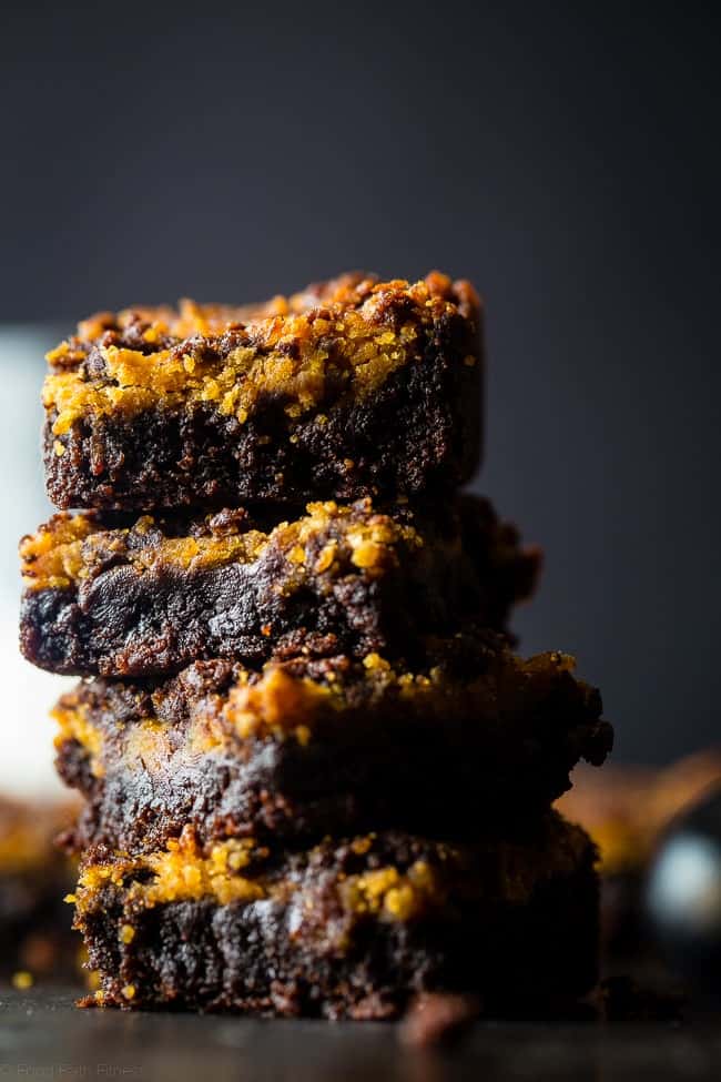 Vegan Peanut Butter Cookie Dough Stuffed Brownies - You'll never believe these dense, chewy vegan brownies are completely oil and butter free, and are a healthy, gluten free treat for only 150 calories! | Foodfaithfitness.com | @FoodFaithFit