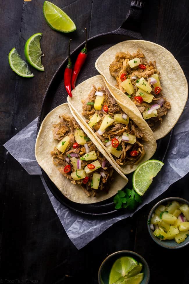 Slow Cooker Green Curry Pork Tacos - These pork tacos have the spicy-sweet taste of Thai curry and pineapple salsa! They're made in the slow cooker for an easy, gluten free and healthy meal! | Foodfaithfitness.com | @FoodFaithFit
