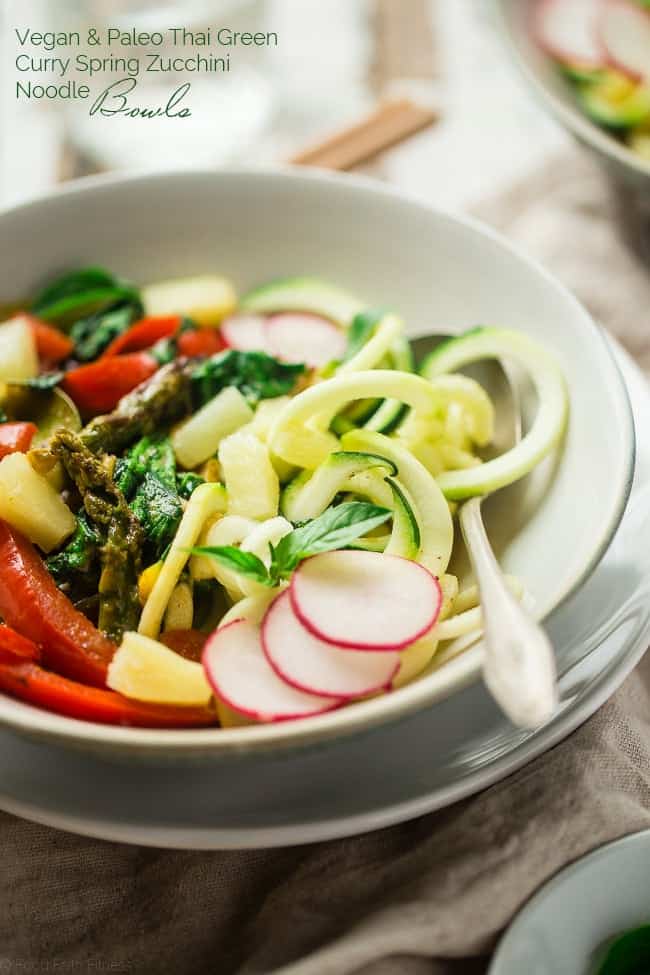 Vegan and Paleo Green Coconut Curry Spring Veggie Bowls with Zucchini Noodles - These easy bowls are made with pineapple, spring veggies, zucchini noodles and a creamy green coconut curry sauce! They're perfect for Meatless Monday and only 250 calories! | Foodfaithfitness.com | @FoodFaithFit