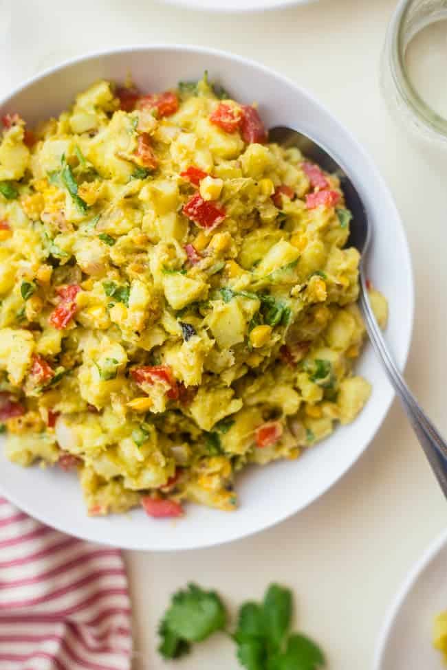 Vegan Mexican Sweet Potato Salad - This easy Mexican sweet potato salad has a spicy avocado chipotle dressing and grilled corn! It's a simple, gluten free and vegan-friendly side dish! | Foodfaithfitness.com | @FoodFaithFit