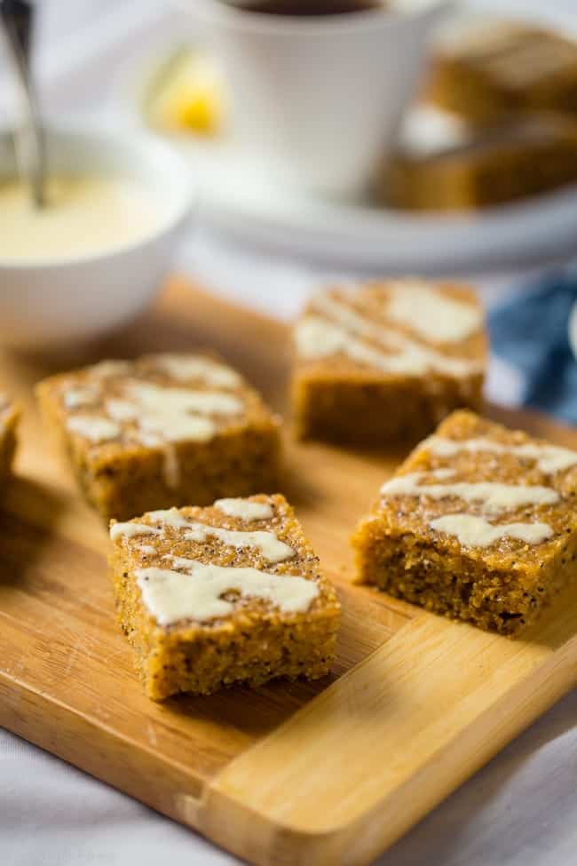 Gluten Free Slower Cooker Lemon Poppy Seed Cake Bars - These easy, low carb cake bars are made in the slow cooker! They're soft, chewy and secretly healthy, gluten/grain free and packed with protein! | Foodfaithfitness.com | @FoodFaithFit