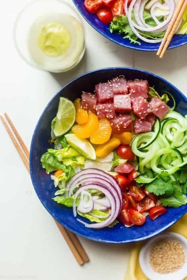 Citrus Tuna Ceviche Bowls - These whole30 compliant bowls are loaded with fresh veggies, zucchini noodles and creamy avocado dressing! They're an easy, healthy and gluten free, no-cook summer meal! | Foodfaithfitness.com | @FoodFaithFit