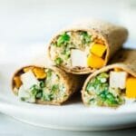 Grilled Mango Chicken Cauliflower Rice Wrap - This healthy, smoky-sweet wrap has grilled chicken, mango and ginger cauliflower rice! It's a quick and easy portable meal that's big on flavor and perfect for lunchboxes! Gluten free option included! | Foodfaithfitness.com | @FoodFaithFit