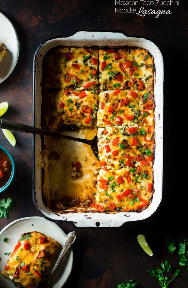 Mexican Zucchini Lasagna - This lasagna has all the cheesy, saucy taste but without the carbs and calories! It's a healthy, gluten free and protein-packed crowd-pleasing dinner that's only 280 calories! Make-ahead and freezer friendly too! | Foodfaithfitness.com | @FoodFaithFit