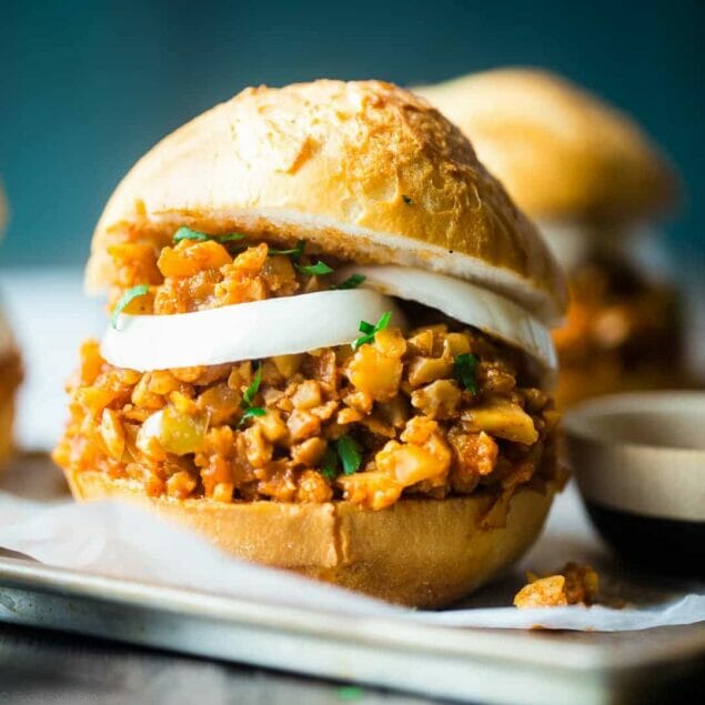 Vegan Sloppy Joes - You will never believe that this quick and easy, one-pot dinner uses cauliflower instead of meat! They're a healthy, gluten free, crowd pleasing dinner that's ready in under 30 mins and are under 300 calories! | Foodfaithfitness.com | @FoodFaithFit