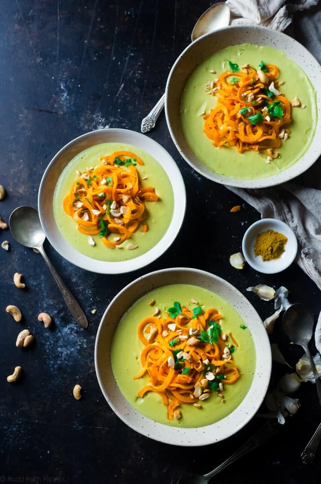  Vegan Cauliflower Coconut Curry Soup with Sweet Potato Noodles - This easy soup is made extra creamy with cauliflower and cashew cream! Top it with sweet potato noodles for a gluten free meal that is paleo friendly! | Foodfaithfitness.com | @FoodFaithFit