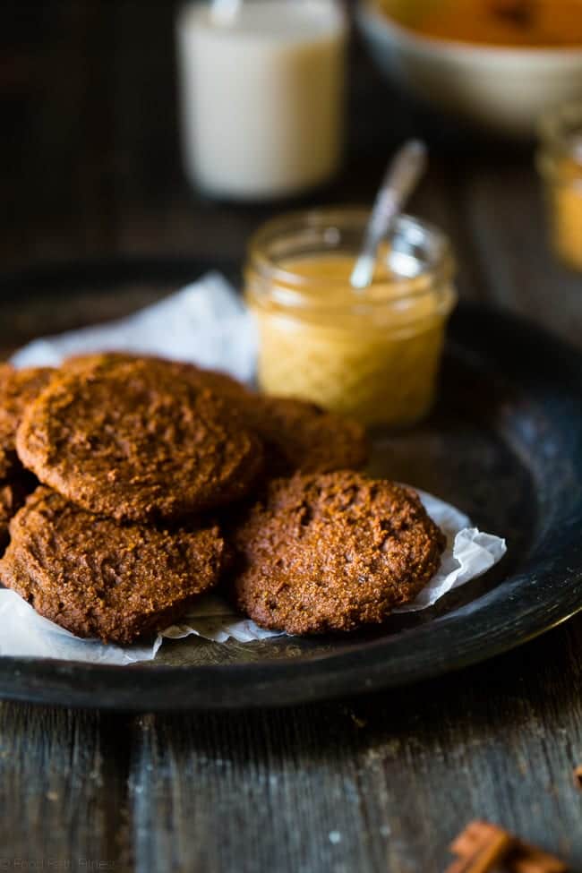 6 Ingredient Pumpkin Paleo Cookies - Soft, cakey and only 70 calories! They're made in one bowl, are butter and oil free, and are the perfect healthy cookies for fall! | Foodfaithfitness.com | @FoodFaithFit