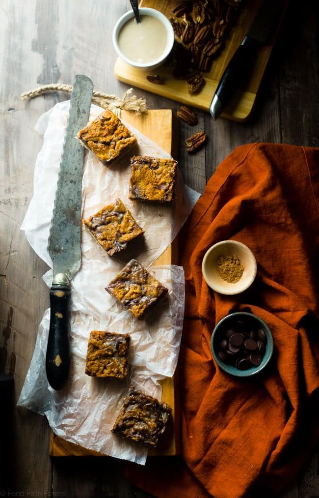 Vegan Pumpkin Spice Paleo Magic Cookie Bars - A healthier, dairy and gluten free version of the classic dessert that are packed with spicy-sweet fall flavors and are so easy to make! | Foodfaithfitness.com | @FoodFaithFit