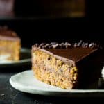 Paleo Cacao Banana Bread Cake - This show stopping cake has a rich, creamy almond butter chocolate ganache! You'll never know it's a healthier, paleo and vegan friendly dessert! | Foodfaithfitness.com | @FoodFaithFit