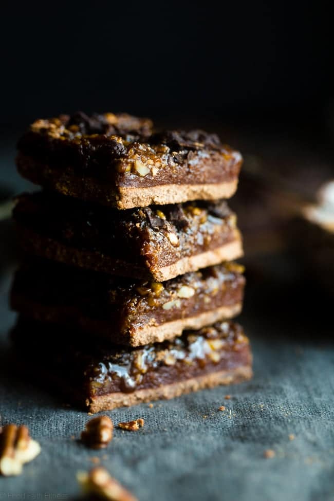 Chocolate Caramel Paleo Pecan Pie Bars - These easy paleo pecan pie bars have a layer of creamy date caramel! They're a vegan friendly and gluten free, healthier dessert for the Holidays! | Foodfaithfitness.com | @FoodFaithFit