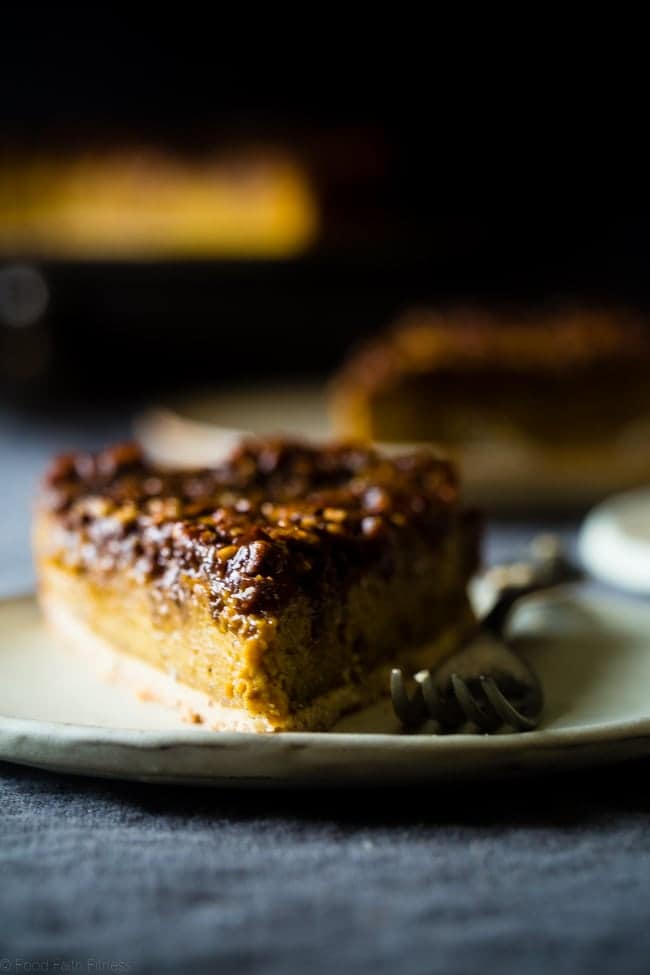 Vegan and Paleo Pecan Pie Pumpkin Cheesecake - A pecan pie filling sits on top of a creamy, pumpkin cheesecake in this show stopping dessert for the holidays! You'll never guess it healthy and gluten/dairy/egg free! | Foodfaithfitness.com | @FoodFaithFit