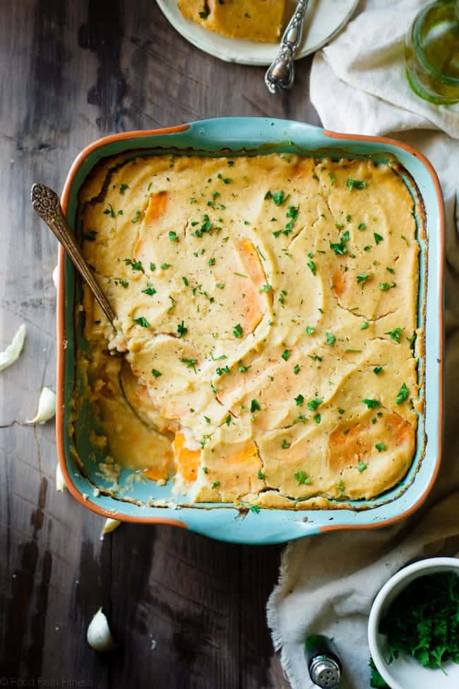 Cauliflower Alfredo Vegan Scalloped Sweet Potatoes - This whole30 compliant side dish is so creamy you'll never know they're under 200 calories, paleo friendly and have hidden veggies! Perfect for Thanksgiving! | Foodfaithfitness.com | @FoodFaithFit