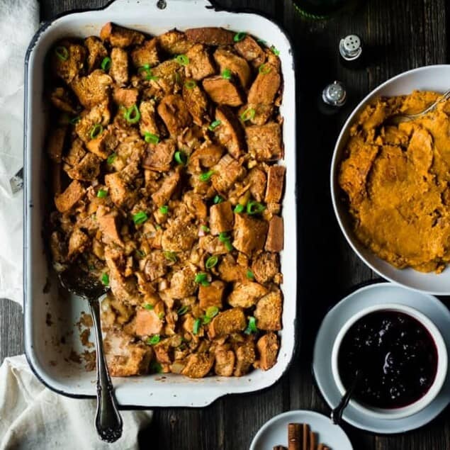 Gluten Free Apple Raisin Stuffing - This easy, gluten free stuffing is made from a mixture of bread and cinnamon raisin bagels! It's the perfect simple, healthy Thanksgiving side dish that everyone will love! | Foodfaithfitness.com | @FoodFaithFit