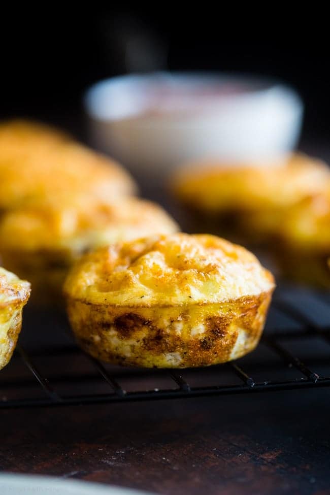 6 Ingredient Taco Egg Muffins - These 6-ingredient, kid-friendly taco breakfast egg muffins have all the Mexican taste without the carbs! They're an easy, healthy, gluten free and protein packed portable breakfast with only 105 calories! | Foodfaithfitness.com| @FoodFaithFit