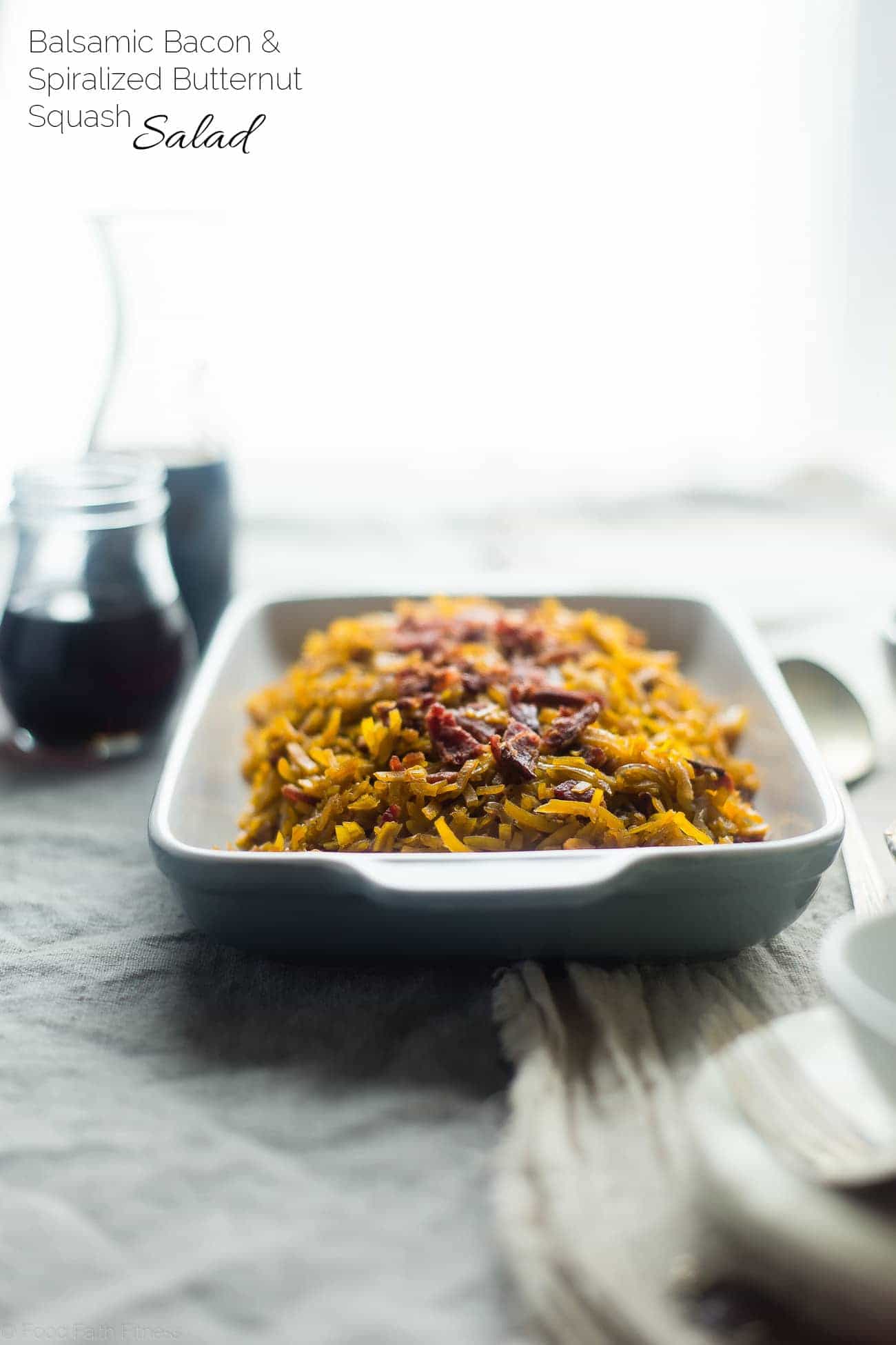 5 Ingredient Bacon Balsamic Butternut Squash Salad - This spiralized butternut squash salad features crispy bacon and a sweet and tangy maple glaze! It's a healthy, paleo friendly side dish with only 5 ingredients! | Foodfaithfitness.com | @FoodFaithFit