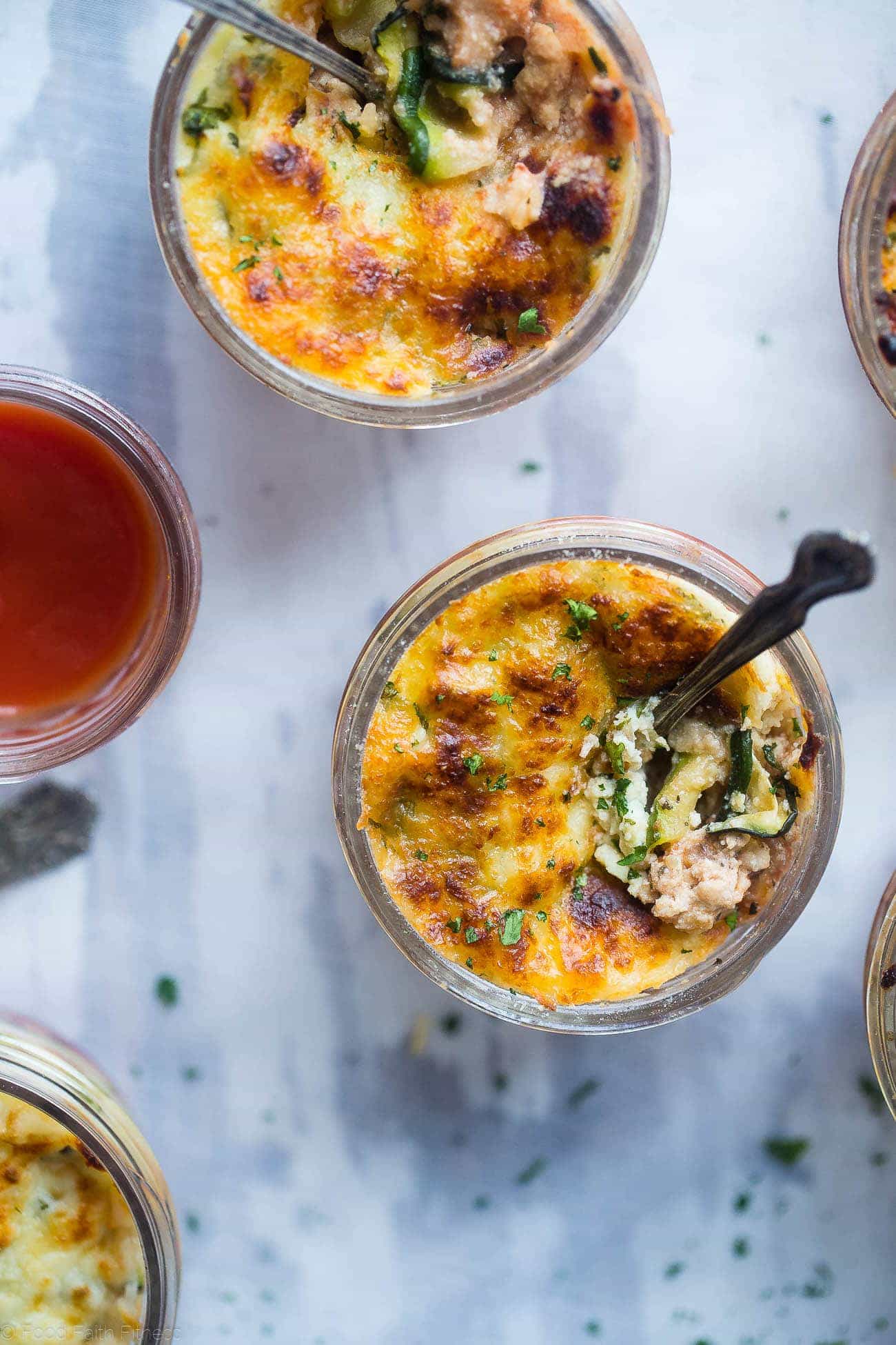 Mason Jar Zucchini Lasagna - The perfect, portable healthy meal that's great for meal prep! They're low carb, gluten free, packed with protein and only 250 calories! | Foodfaithfitness.com | @FoodFaithFit