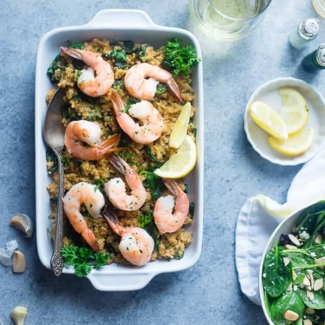 Slow Cooker Garlic Butter Shrimp and Quinoa - This easy, 7 ingredient weeknight dinner is made in the slow cooker! It's a healthy, gluten and lactose free meal that the whole family will love! | Foodfaithfitness.com | @FoodFaithFit