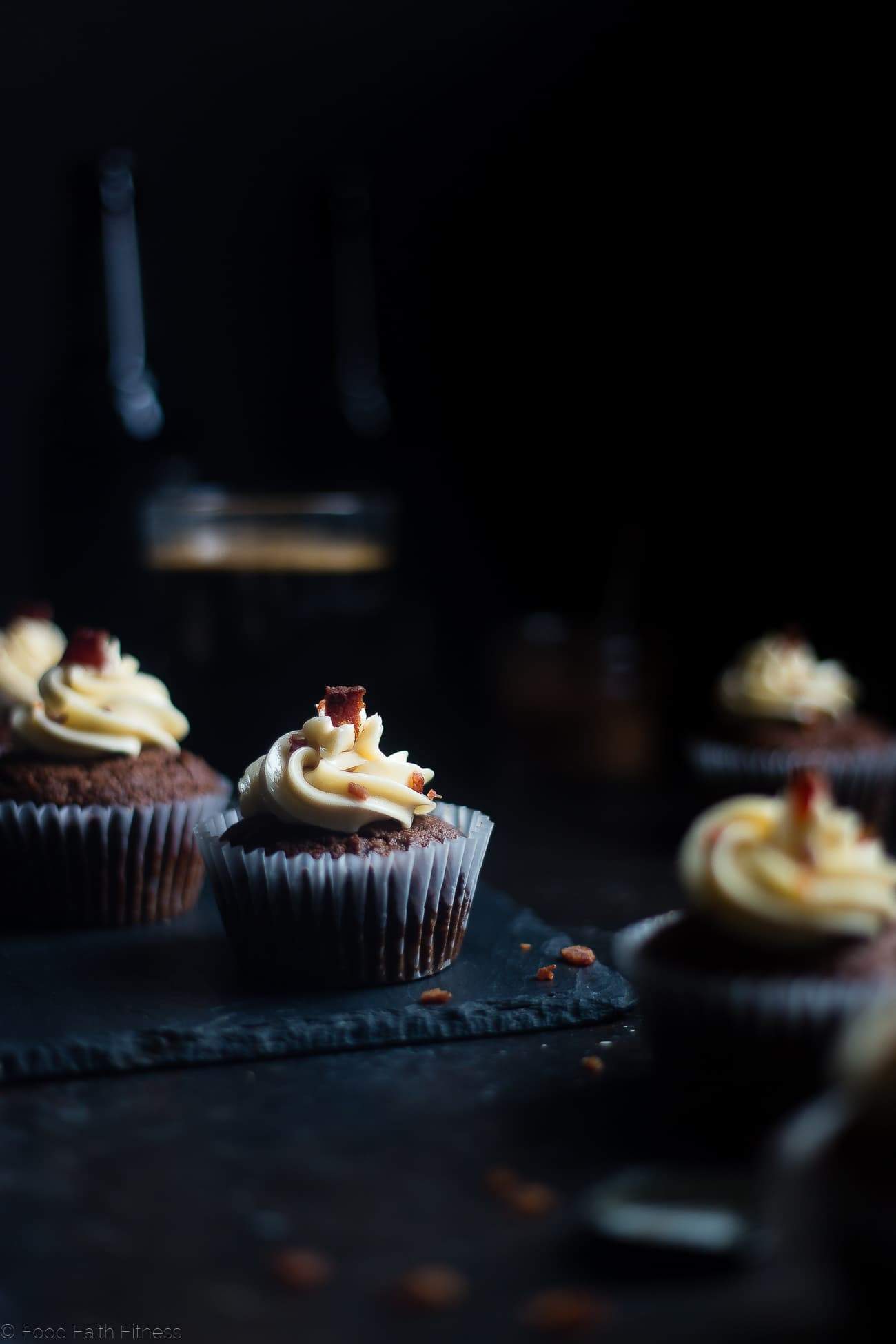 Gluten Free Chocolate Bacon Beer Cupcakes - These gluten free beer cupcakes have a secret, salty bacon twist and bacon fat buttercream! They're an easy dessert that's perfect for St Patrick's Day! | Foodfaithfitness.com | @FoodFaithFit