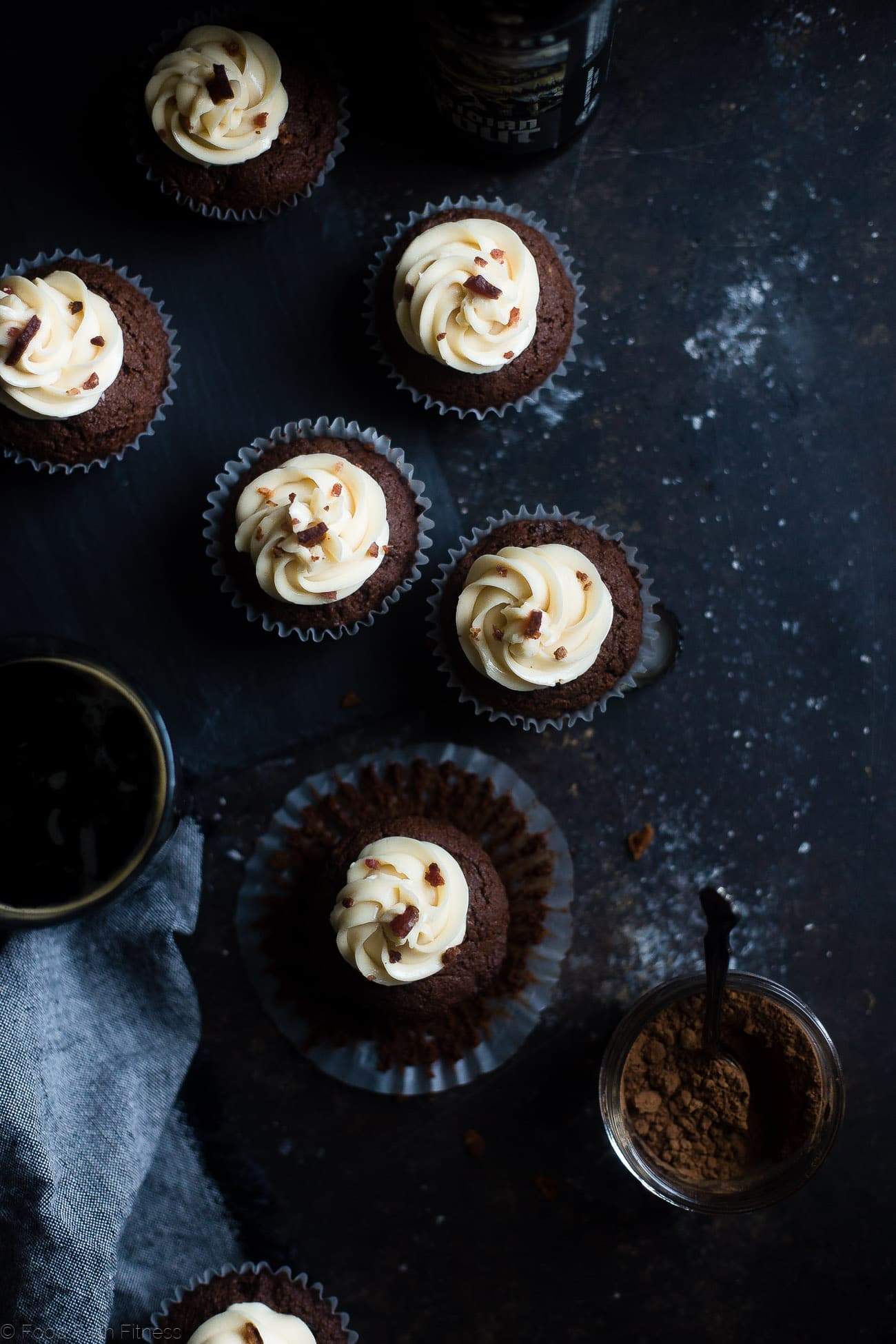 Gluten Free Chocolate Bacon Beer Cupcakes - These gluten free beer cupcakes have a secret, salty bacon twist and bacon fat buttercream! They're an easy, grain free dessert that's perfect for St Patrick's Day! | Foodfaithfitness.com | @FoodFaithFit