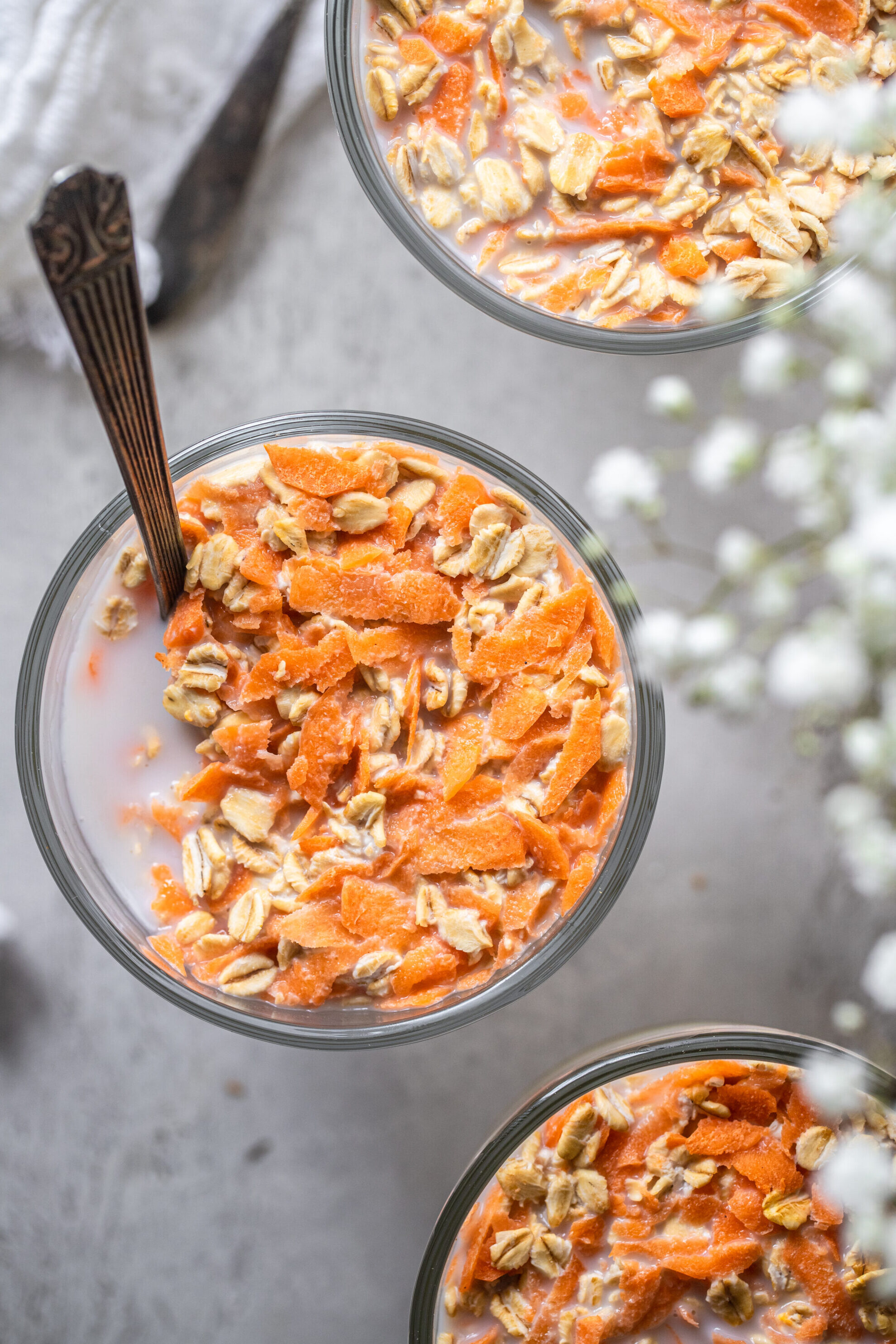 Healthy carrot cake overnight oats close up with toppings
