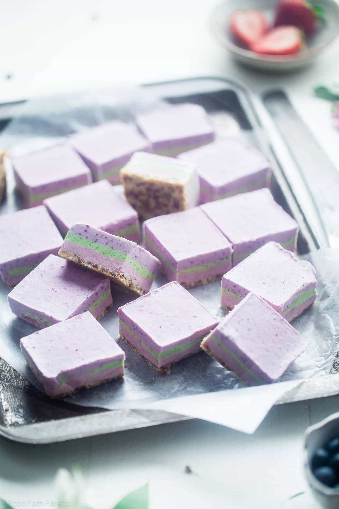 No Bake Superfood Berry Cashew Cream bars - These vegan bars are naturally colored with fruit and vegetables! They're so creamy you'll never know they're healthy and dairy and gluten free! Perfect for Easter! | Foodfaithfitness.com | @FoodFaithFit