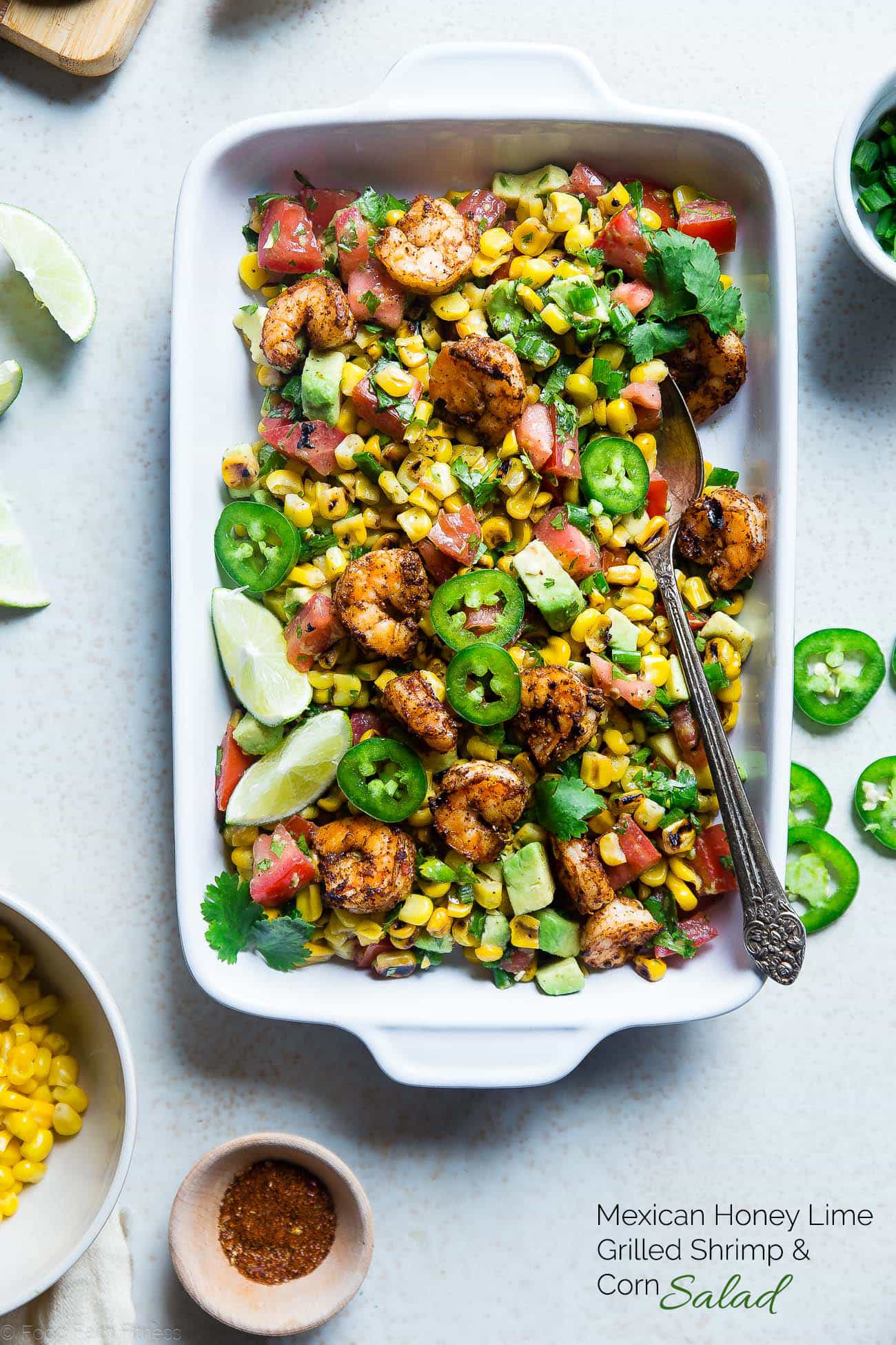  Healthy Honey Lime Grilled Mexican Corn Salad with Shrimp - This quick and easy, gluten free salad is tossed with juicy, smoky shrimp and has a sweet and tangy honey lime vinaigrette! Perfect for summer cook outs! | Foodfaithfitness.com | @FoodFaithFit