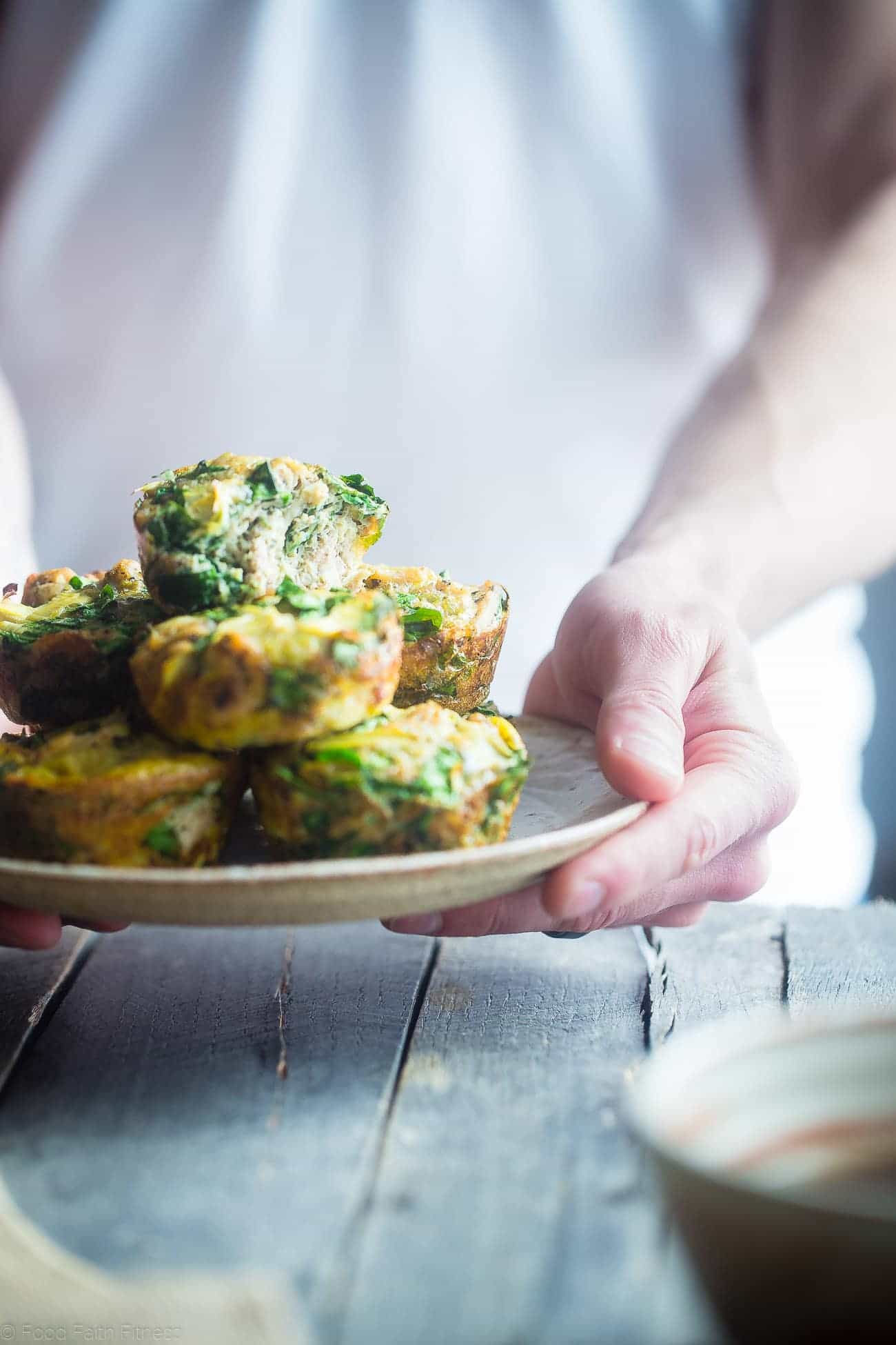 Whole30 Spinach and Artichoke Egg Muffins - These easy, 6 ingredient paleo spinach breakfast egg muffins are low carb, gluten free, and under 100 calories! Perfect for busy mornings! | Foodfaithfitness.com | @FoodFaithFit