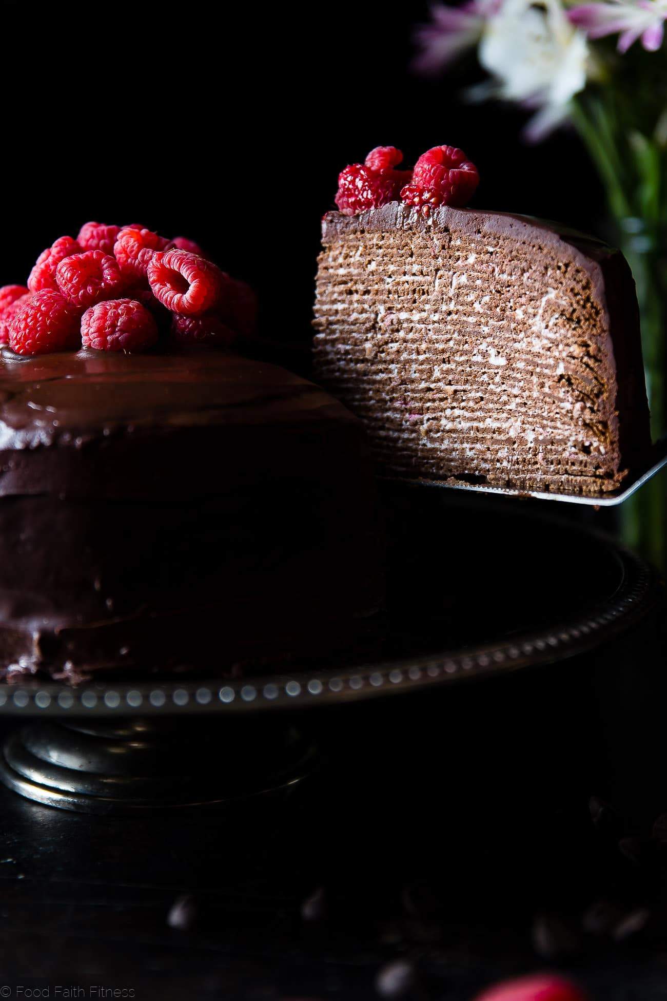 Raspberry Chocolate Vegan Crepe Cake - These crepe cake is made of chocolate crepes layered with raspberries and creamy coconut! It's an impressive healthier, gluten and dairy free dessert that everyone will love! | Foodfaithfitness.com | @FoodFaithFit
