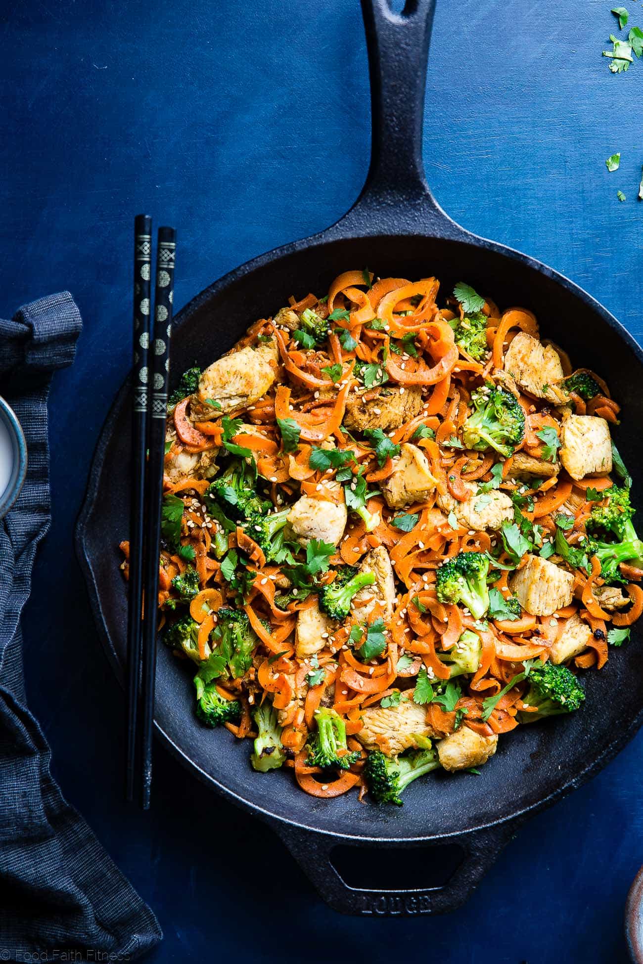 Whole30 Chicken Stir Fry with Cumin Coconut Carrot Noodles - This gluten free, low carb chicken stir fry has creamy coconut, coriander and cardamom! Add broccoli and carrot noodles for a quick and easy, paleo weeknight dinner! | Foodfaithfitness.com | @FoodFaithFit