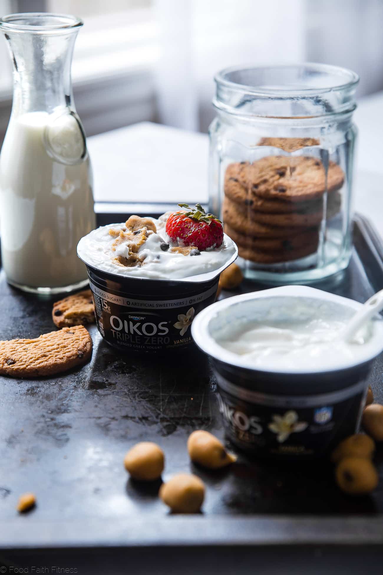 Photo of 2 Greek yogurt cups on a cookie sheet. Recipe on Foodfaithfitness.com