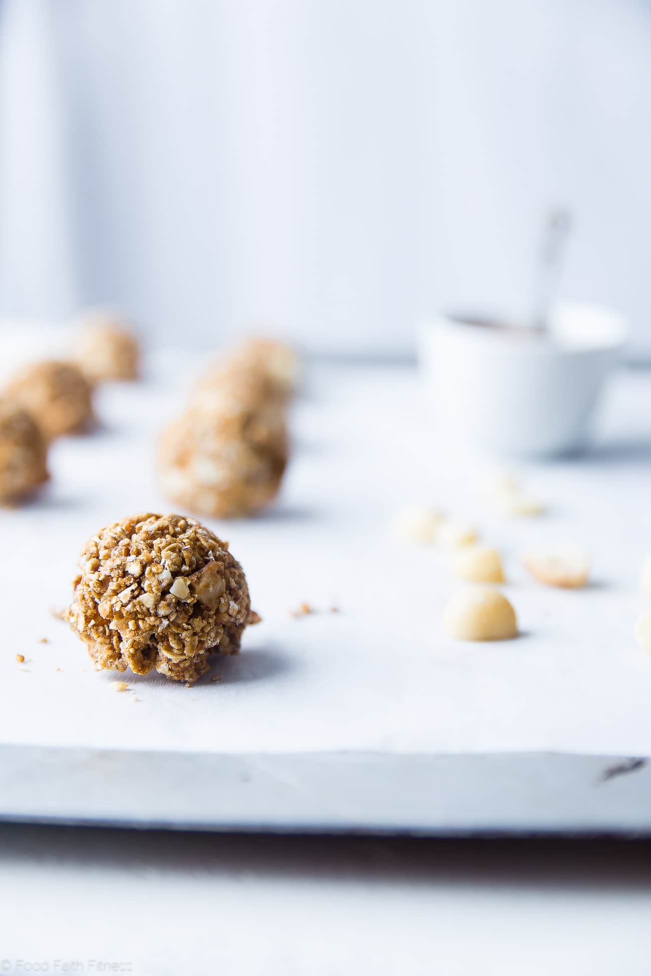Rolling white chocolate macadamia nut cookies. Recipe on Foodfaithfitness.com