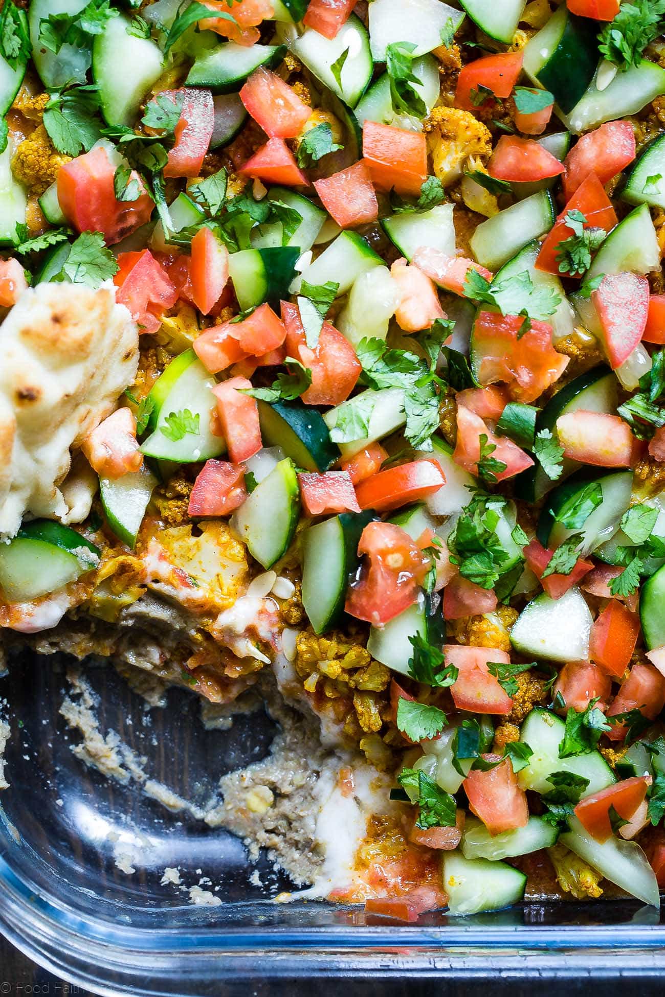 Healthy Indian 7 Layer Dip - The classic 7 layer dip recipe gets a healthy, Indian makeover! This dip is loaded with spicy, ethnic flavors and is gluten free and vegan friendly too! It's only 170 calories and perfect for game day! | Foodfaithfitness.com | @FoodFaithFit