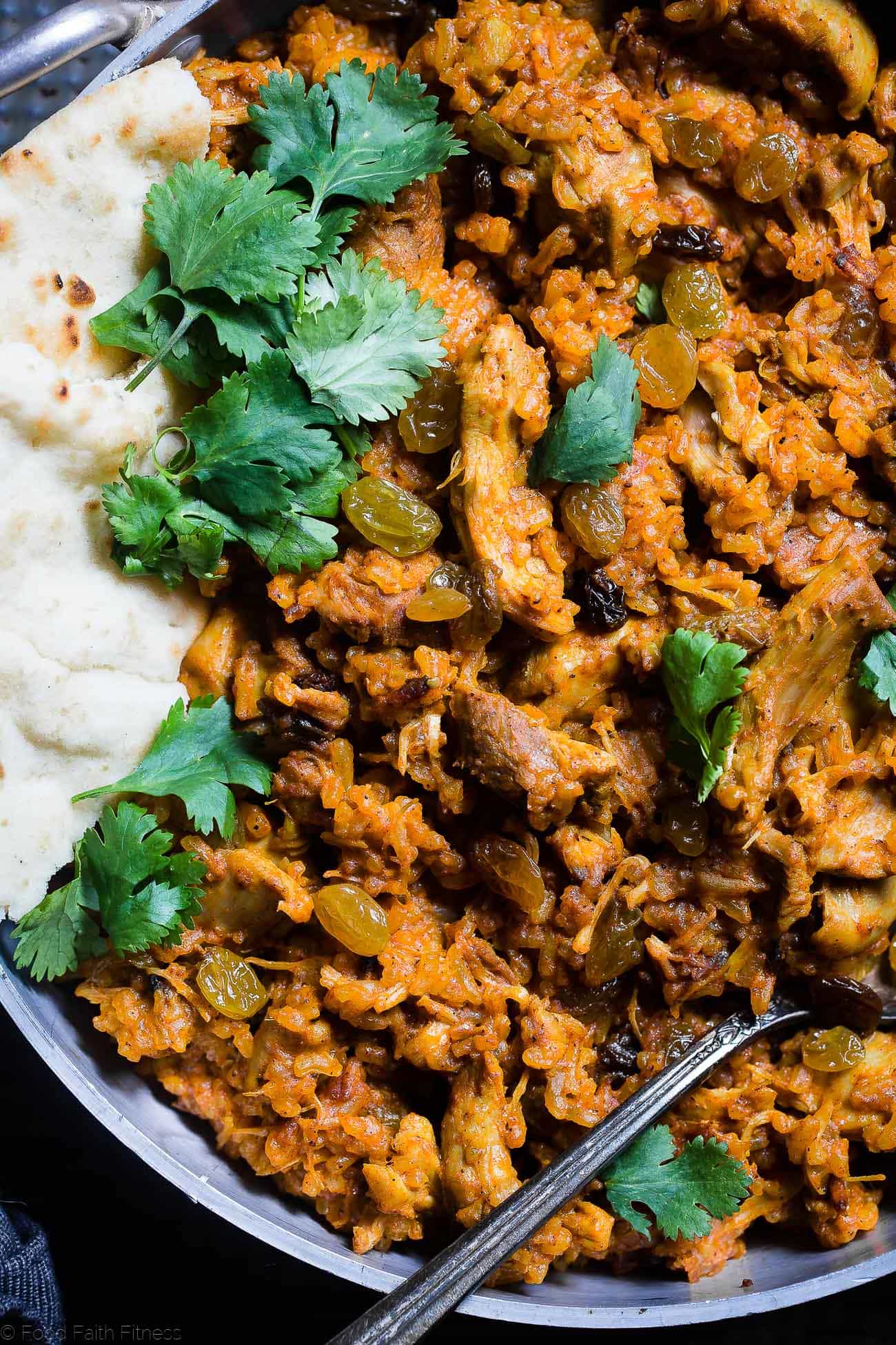 Indian Chicken Rice Casserole - This dairy and gluten free casserole is made in one pot and has delicious Indian curry flavors! It's a quick and easy, healthy weeknight meal that freezes well and makes great leftovers! | Foodfaithfitness.com | @FoodFaithFit