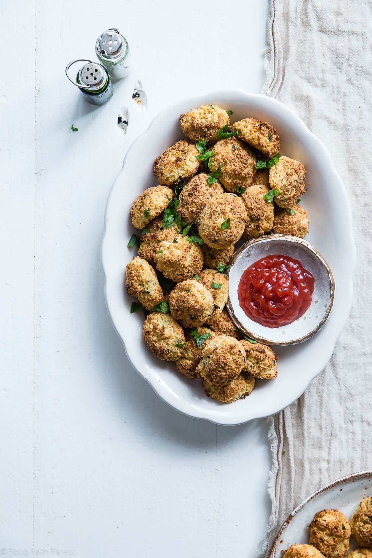 Paleo Cauliflower Tater Tots - So crispy and crunchy you will never believe they're gluten/grain/dairy free, low carb and made from veggies! Even your kids will love them! | Foodfaithfitness.com | @FoodFaithFit