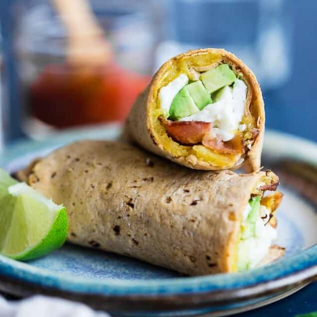 Southwestern Breakfast Burrito - A delicious, gluten free and protein packed breakfast for busy mornings that uses taco seasoned, roasted acorn squash to give it a sweet and spicy flavor! | Foodfaithfitness.com | @FoodFaithFit