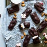 Low Carb Almond Joy Bars - These homemade paleo almond joy bars are a healthy, low carb remake of the classic candy bar that you will never believe are sugar, dairy, grain and gluten free! | Foodfaithfitness.com | @FoodFaithFit