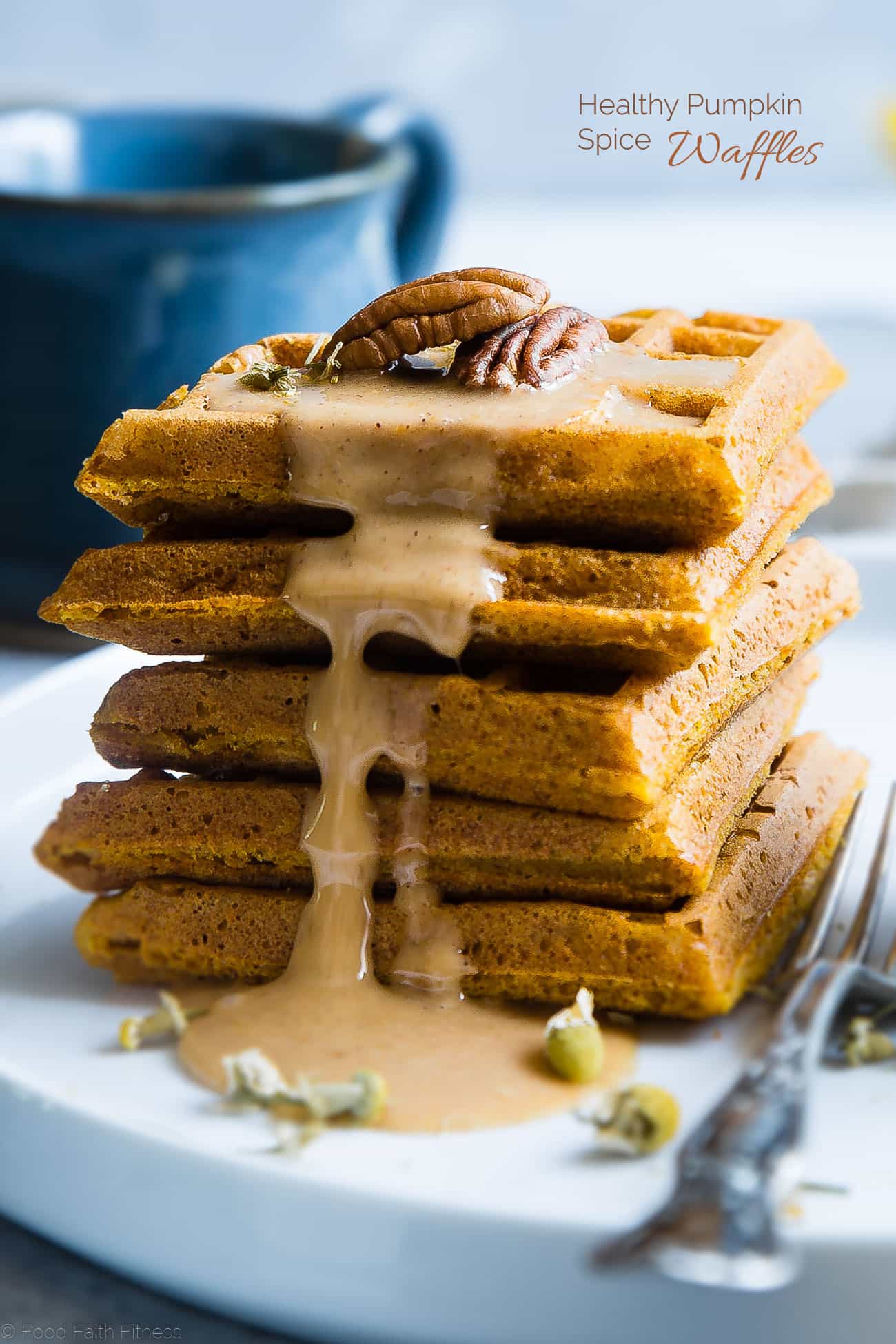 The BEST Pumpkin Spice Paleo Waffles with Pumpkin Cream Sauce - SO light, crispy and airy that you will NEVER believe that these are vegan friendly and gluten, grain, dairy AND sugar free! | Foodfaithfitness.com | @FoodFaithFit