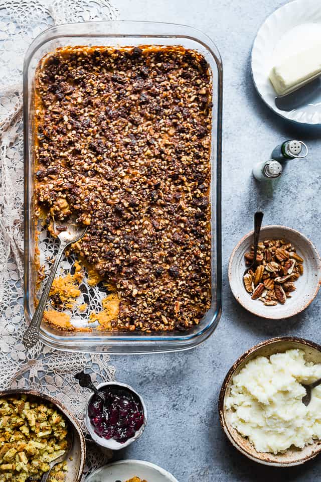 Paleo Easy Healthy Sweet Potato Casserole with Pecan Topping - the best side dish for Thanksgiving! No one will believe it's vegan friendly, whole30 compliant and gluten/grain/dairy/sugar AND egg free! | Foodfaithfitness.com | @FoodFaithFit