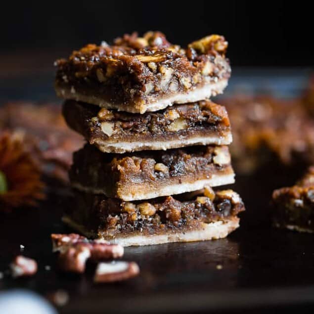 Pumpkin Spice Vegan Pecan Pie Bars - These easy, healthy pecan pie bars are only 8 ingredients and have a pumpkin spice spin! A gluten/grain/dairy/egg free dessert for Thanksgiving that's paleo friendly! | Foodfaithfitness.com | @FoodFaithFit